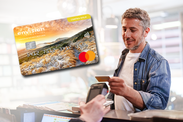 man paying at the store with his credit card